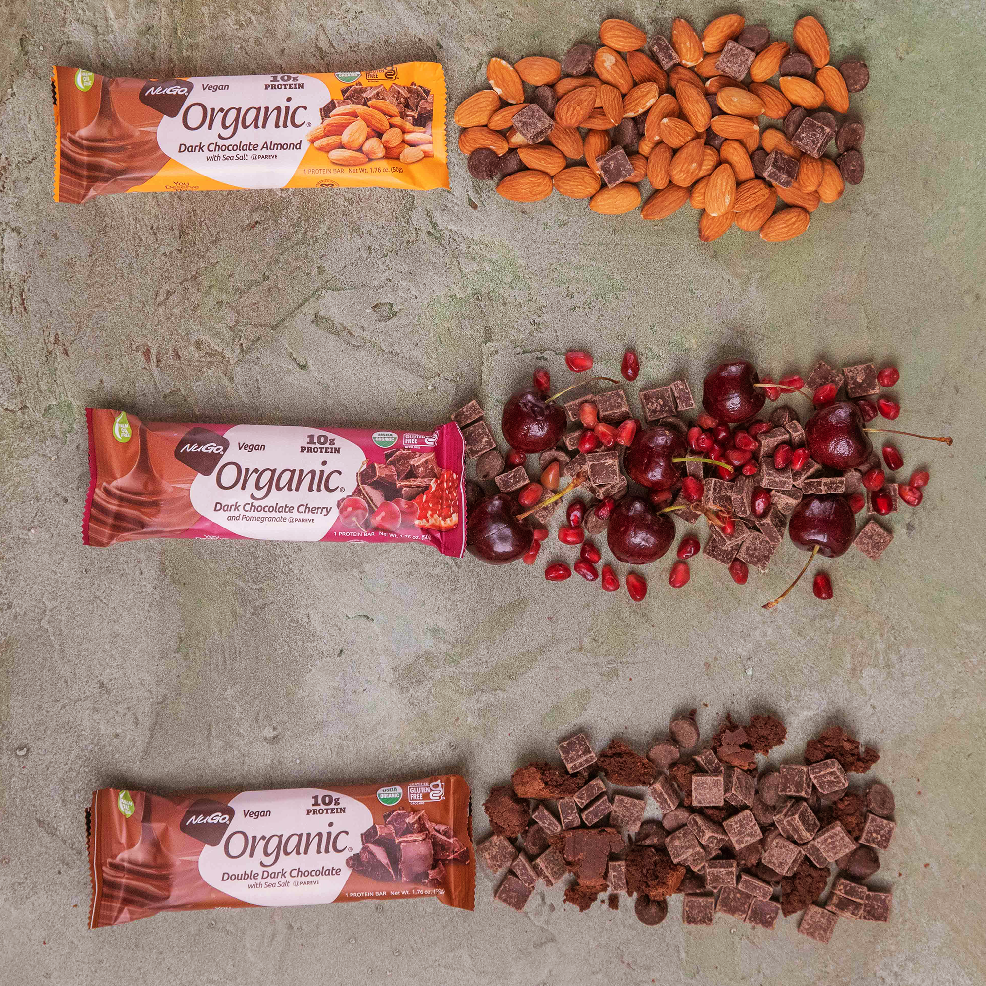 Three flavors of NuGo Organic with Ingredients to the right of each bar